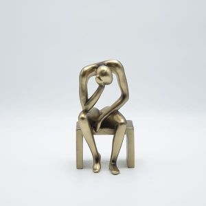 Decorative sculpture figure made of polyresin with a gold surface 11x10x20.5cm
