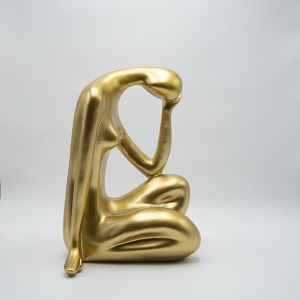 Decorative sculpture figure made of polyresin with a gold surface 27x22x36.5cm