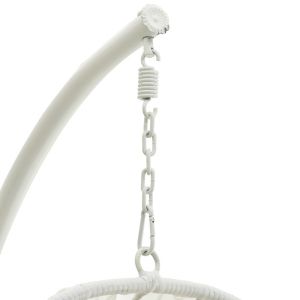 White garden swing, hanging on a metal base, with beige cushions