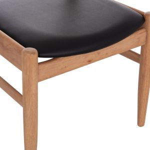 Dining chair Cersei Hm9946.01 made of rubber wood in light oak and synthetic material in black 57x53x72cm.