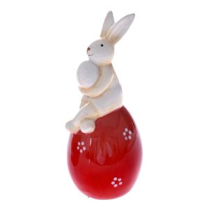 BEIGE CERAMIC RABBIT WITH RED EGG D 6X13 CM